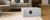 tsf-21-trezorone-sejf-na-laptopa-segregatory-a4-zamek-elektroniczny-total-shopping-w-salonie-przy-sofie-lifestyle-2048x841.png